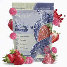 Vitavora Wellness NAD+ Anti-Aging Gummies pouch with strawberry and raspberry styling, showing packaging callouts for Instant Absorption, Deep Repair, Age Defiance, and Youth Recharge, plus a Strawberry Infused seal on a 30-serving supplement pouch.